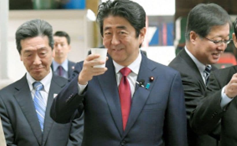 Japan’s Shinzo Abe enjoys raw milk in Fukushima